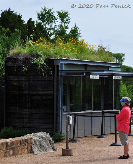 39_Entry_kiosk_Green_roof_Masked_woman-1.jpg