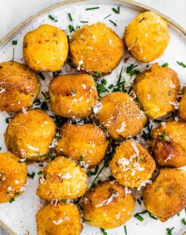 Mashed potato balls on a white plate. Mashed potato balls on a white plate.