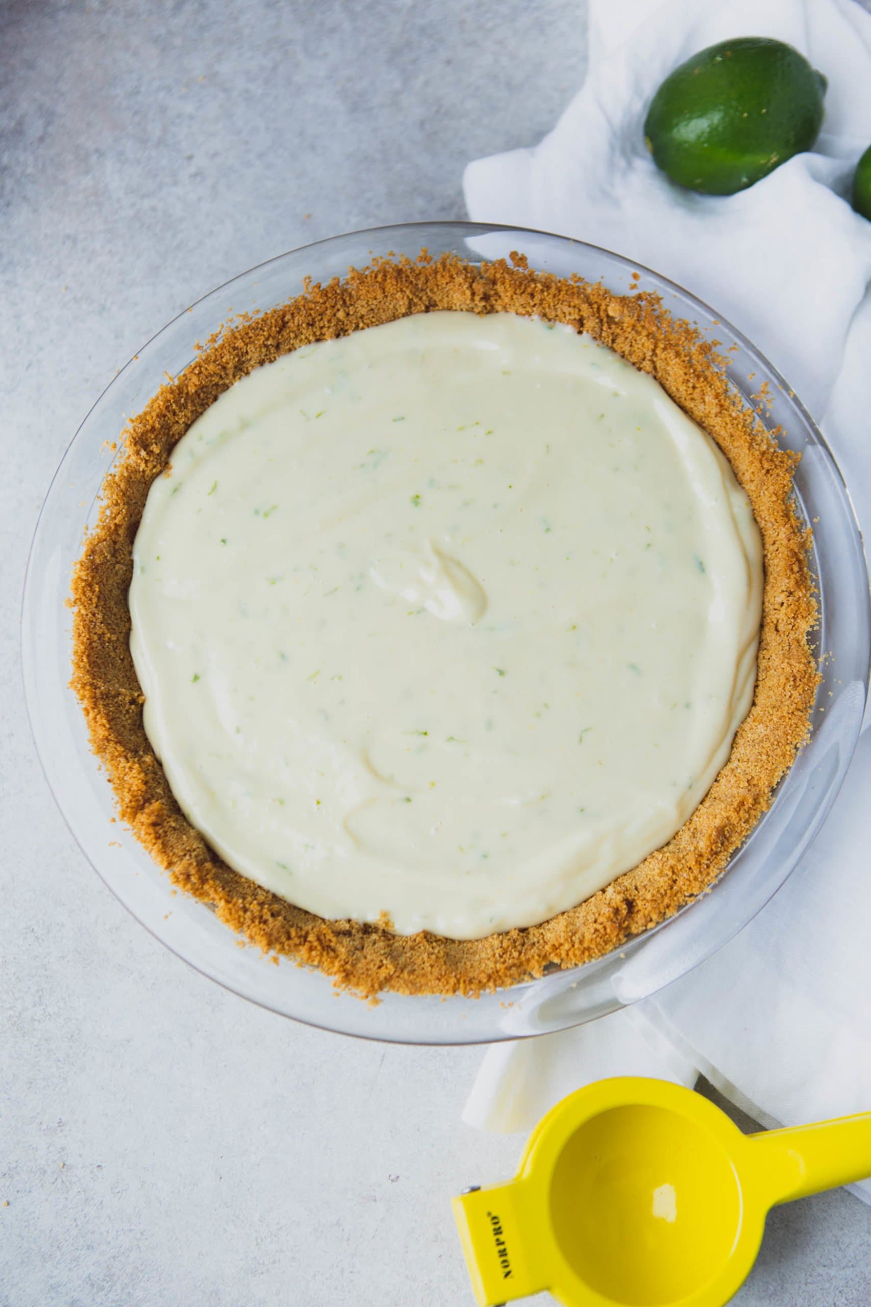 A key lime pie in a graham cracker crust. 