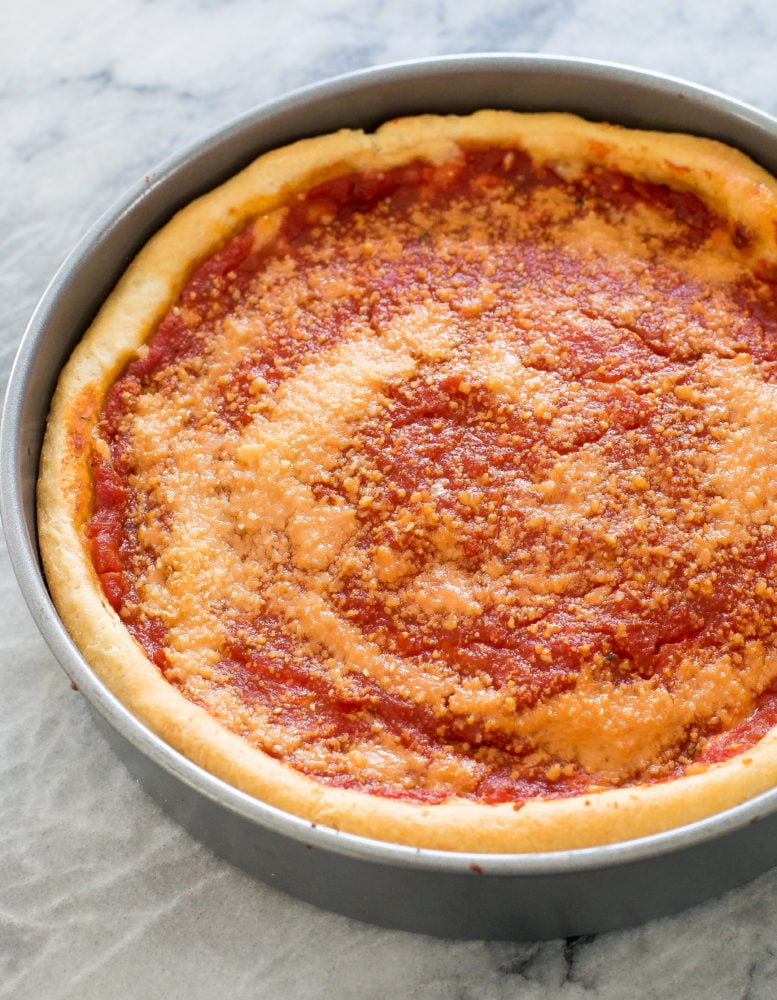 Deep dish pizza in a pan baked. 