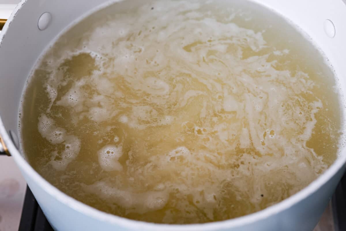Pasta cooking in a pot.