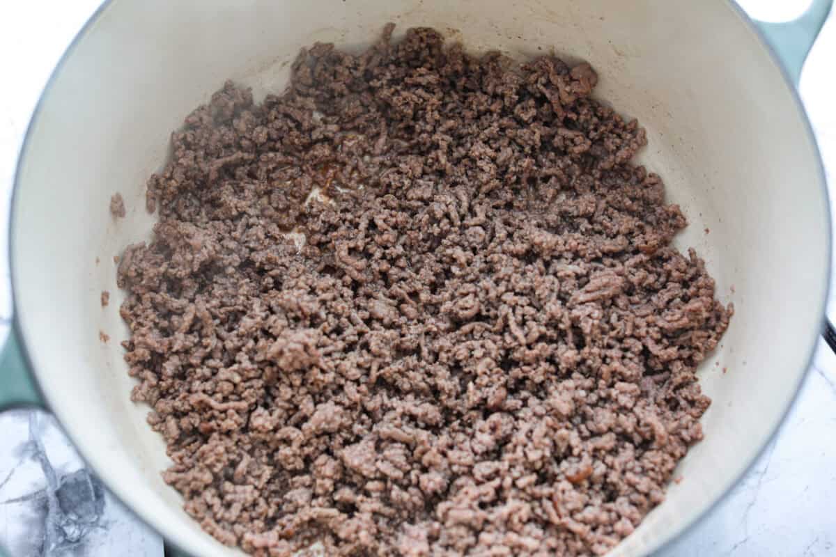 Ground beef cooking in a pot. 