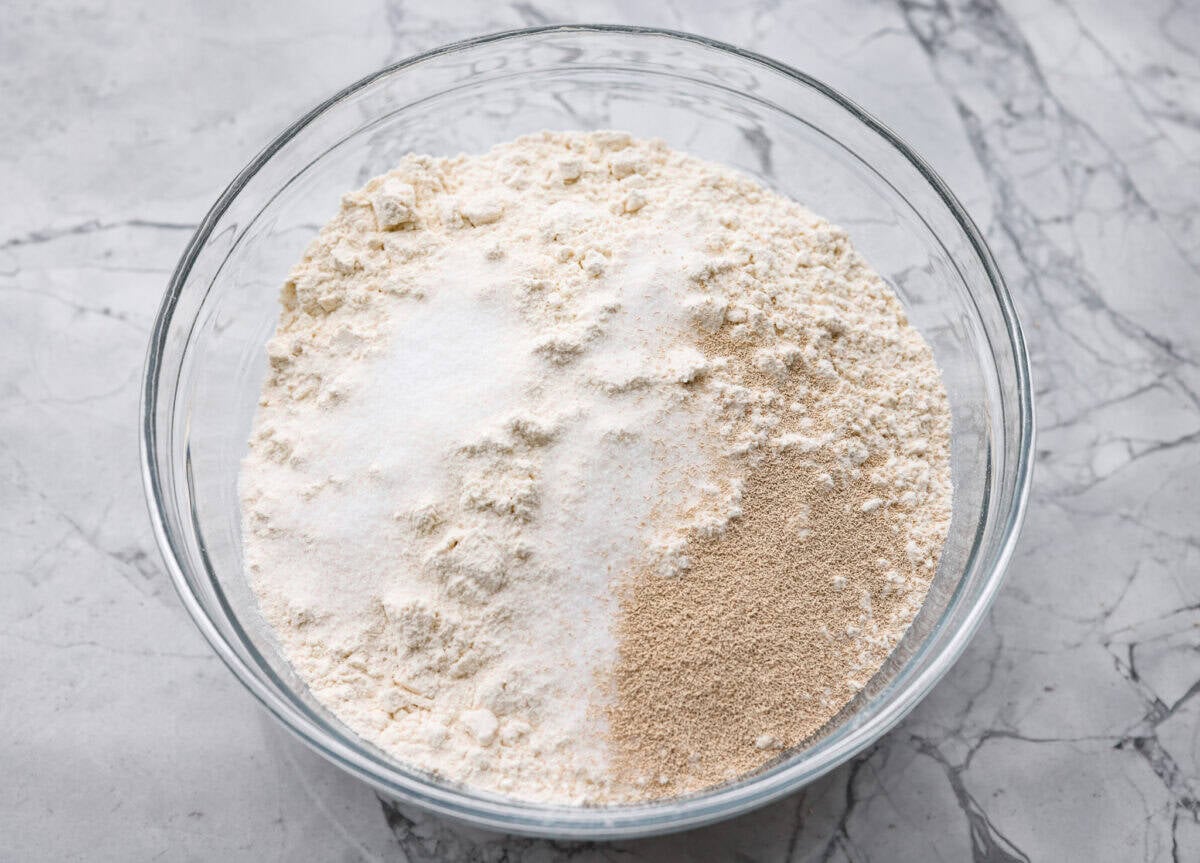 All of the dry ingredients added to a bowl. 