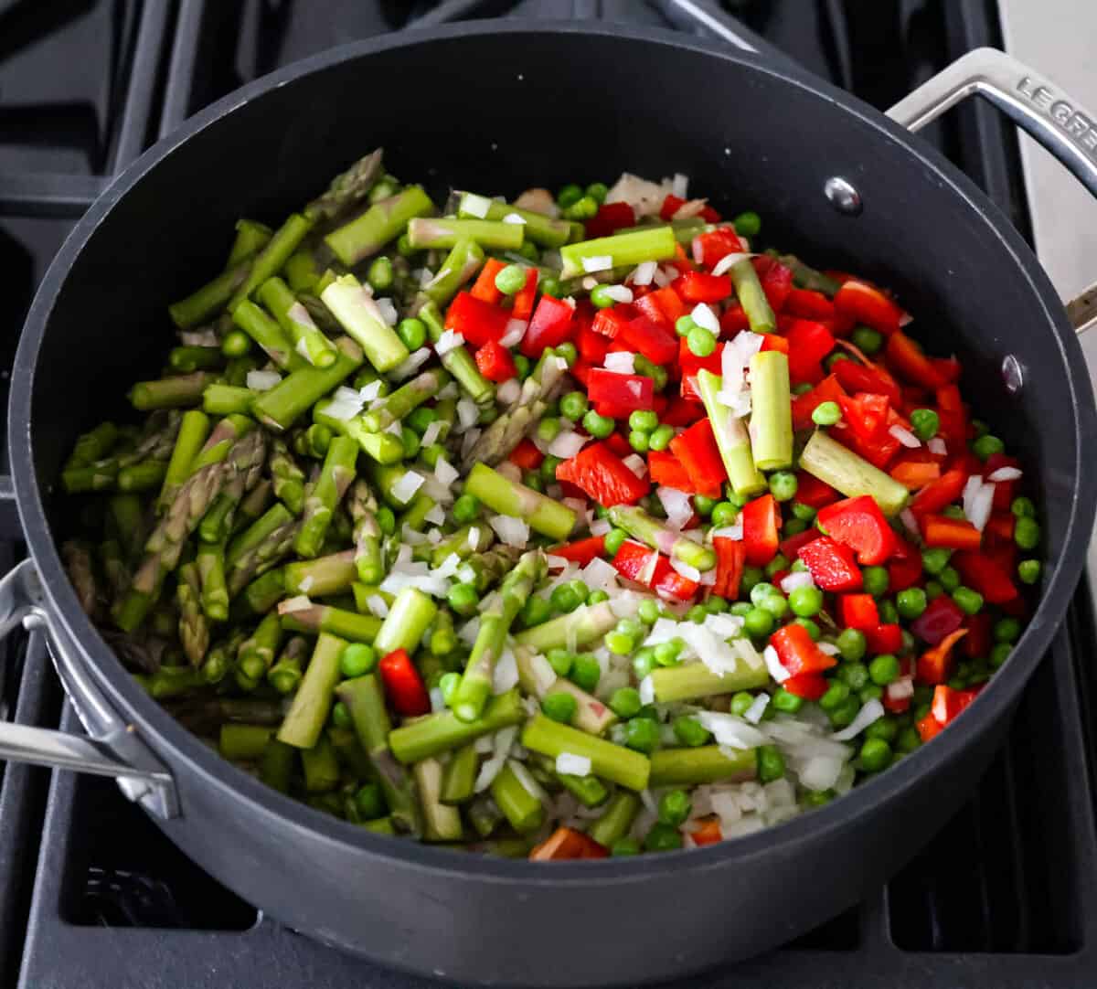 The vegetables for the chipotle pasta being cooked until tender.