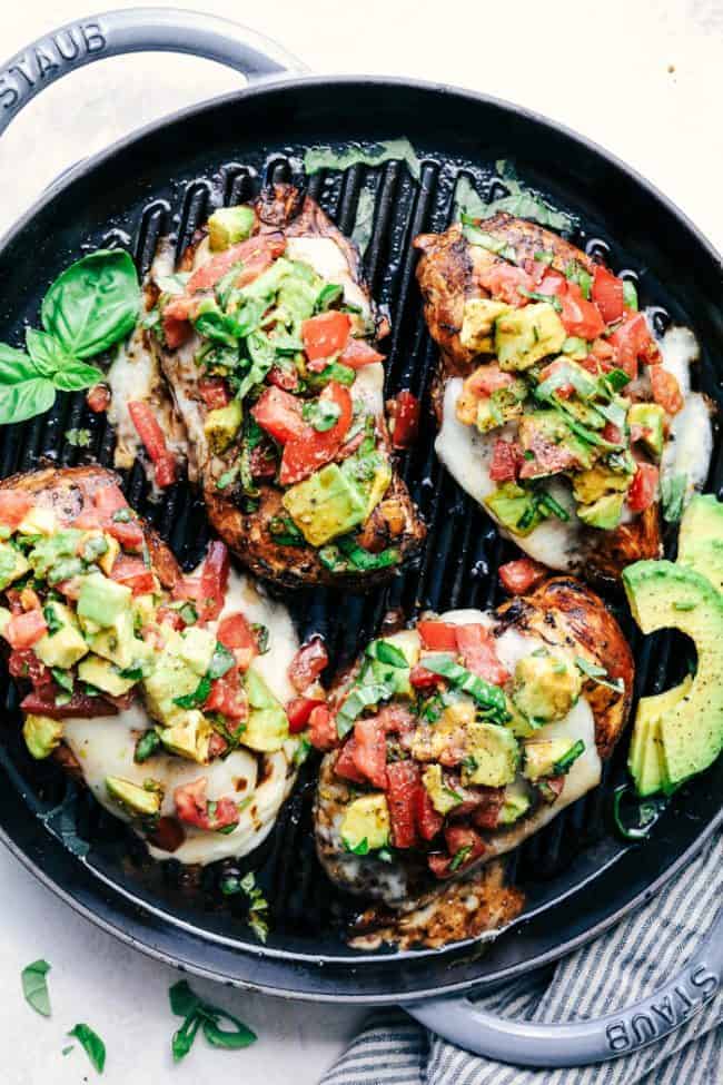 Grilled California Avocado Chicken in a black skillet.