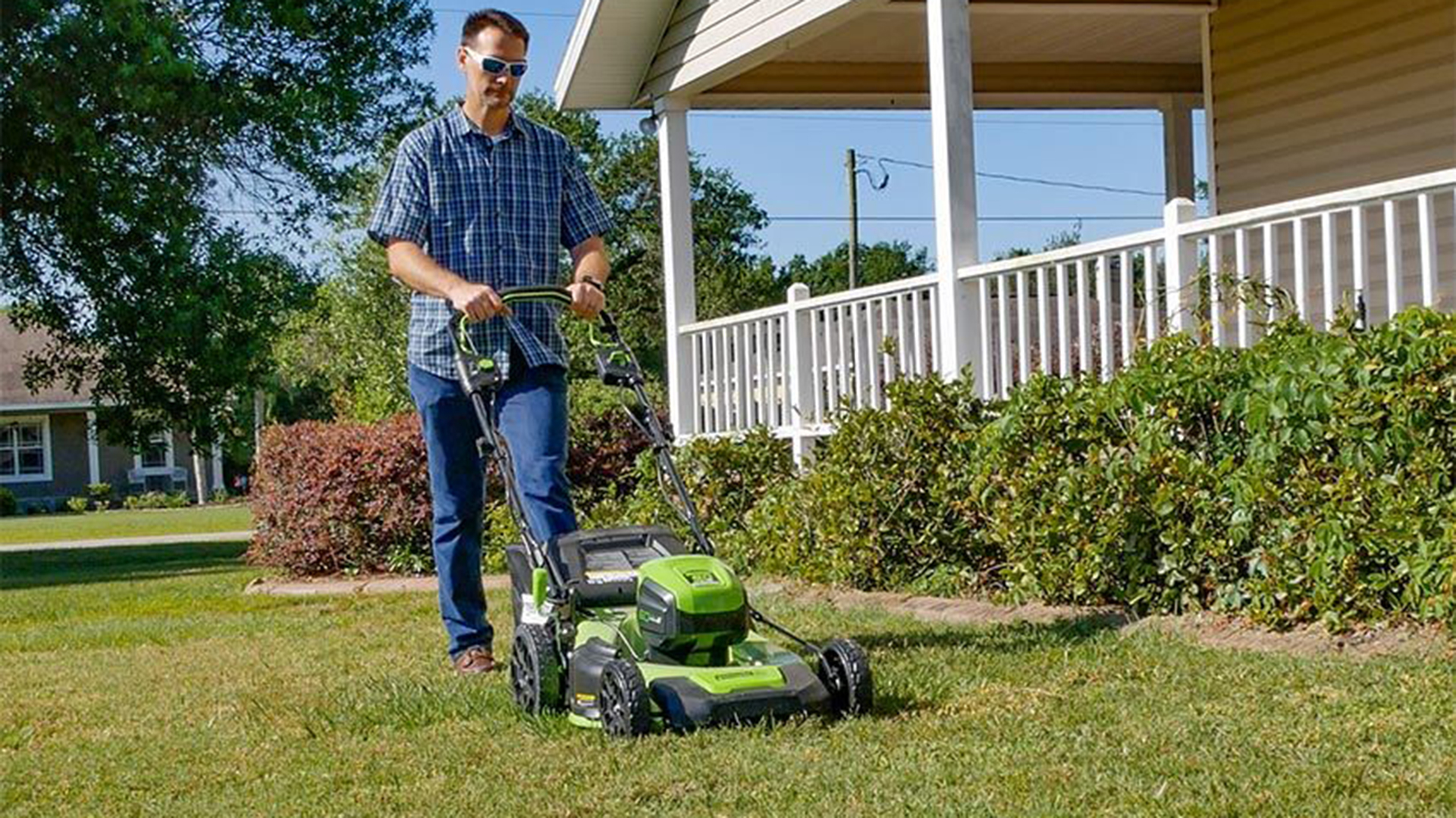 Greenworks vs Ryobi: image of man operating Greenworks Pro 60V