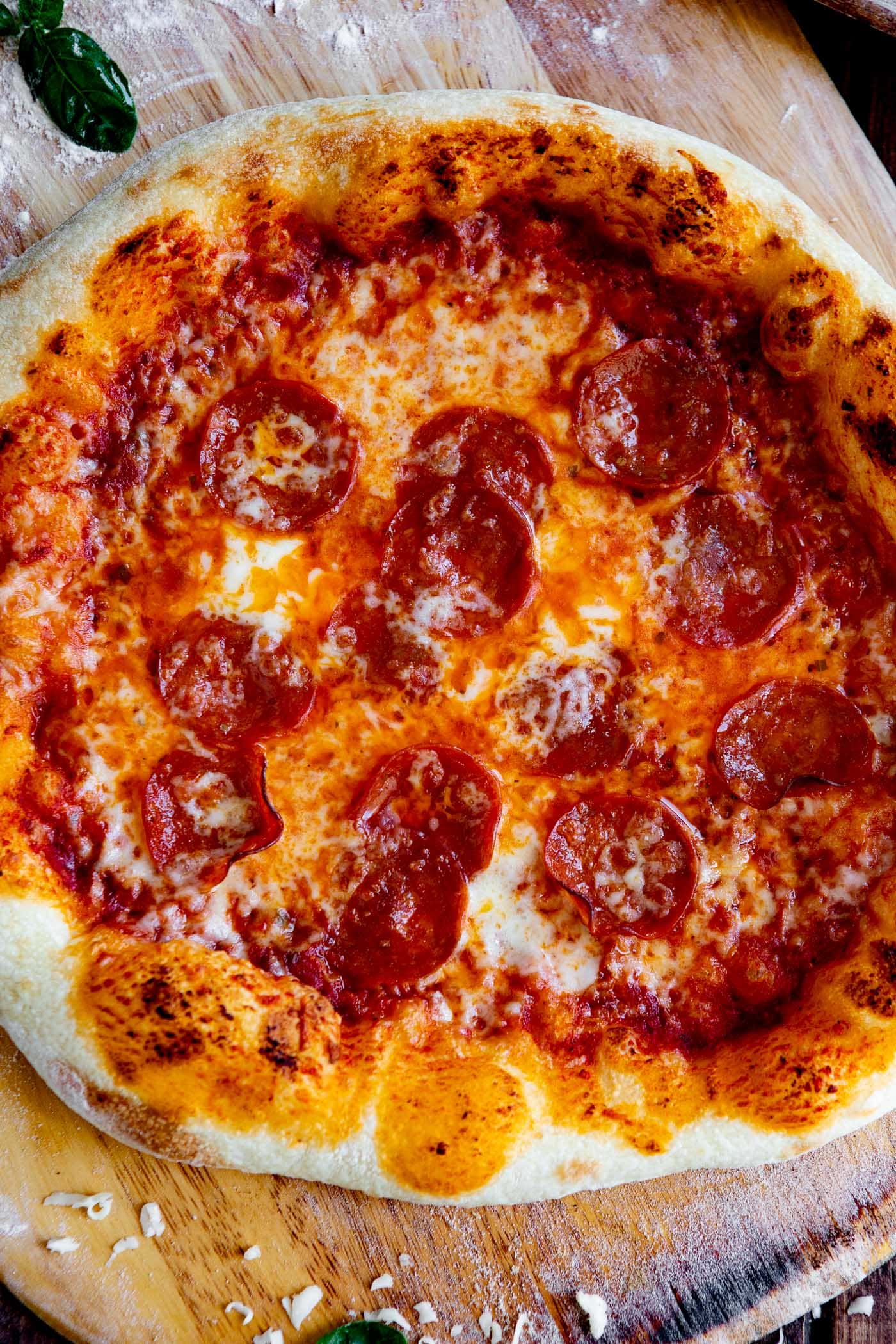 a pepperoni pizza with a homemade pizza crust and pizza sauce