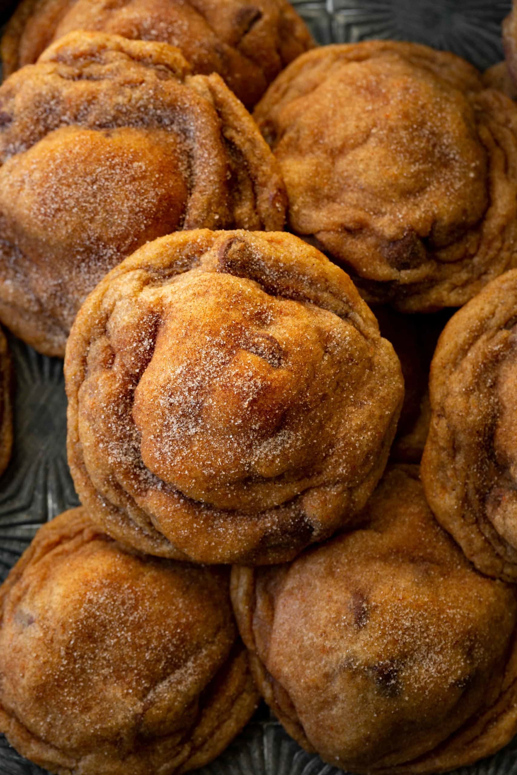 a photo of cinnamon and sugar coated pumpkin pudding cookies.