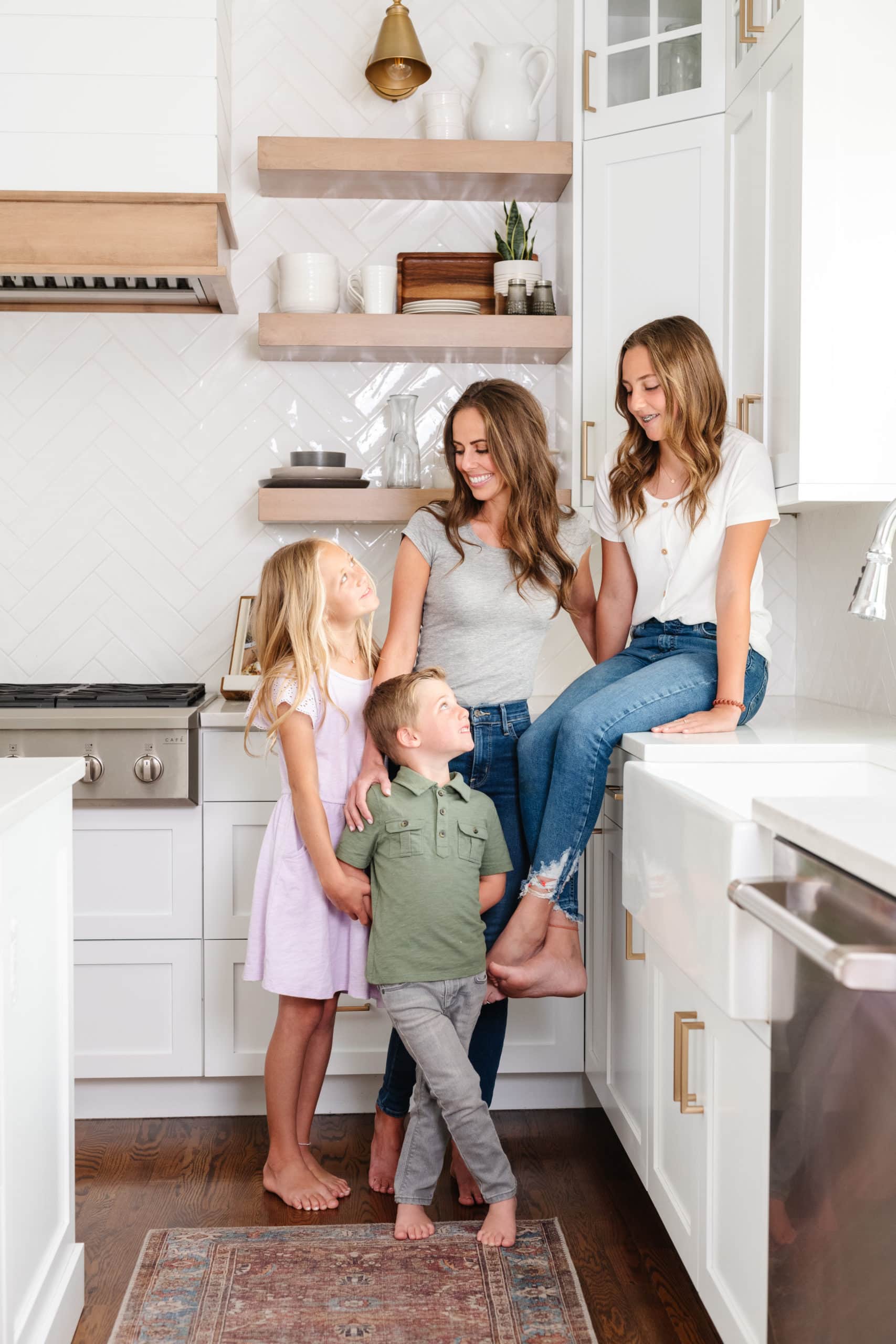 mom with kids in the kitchen