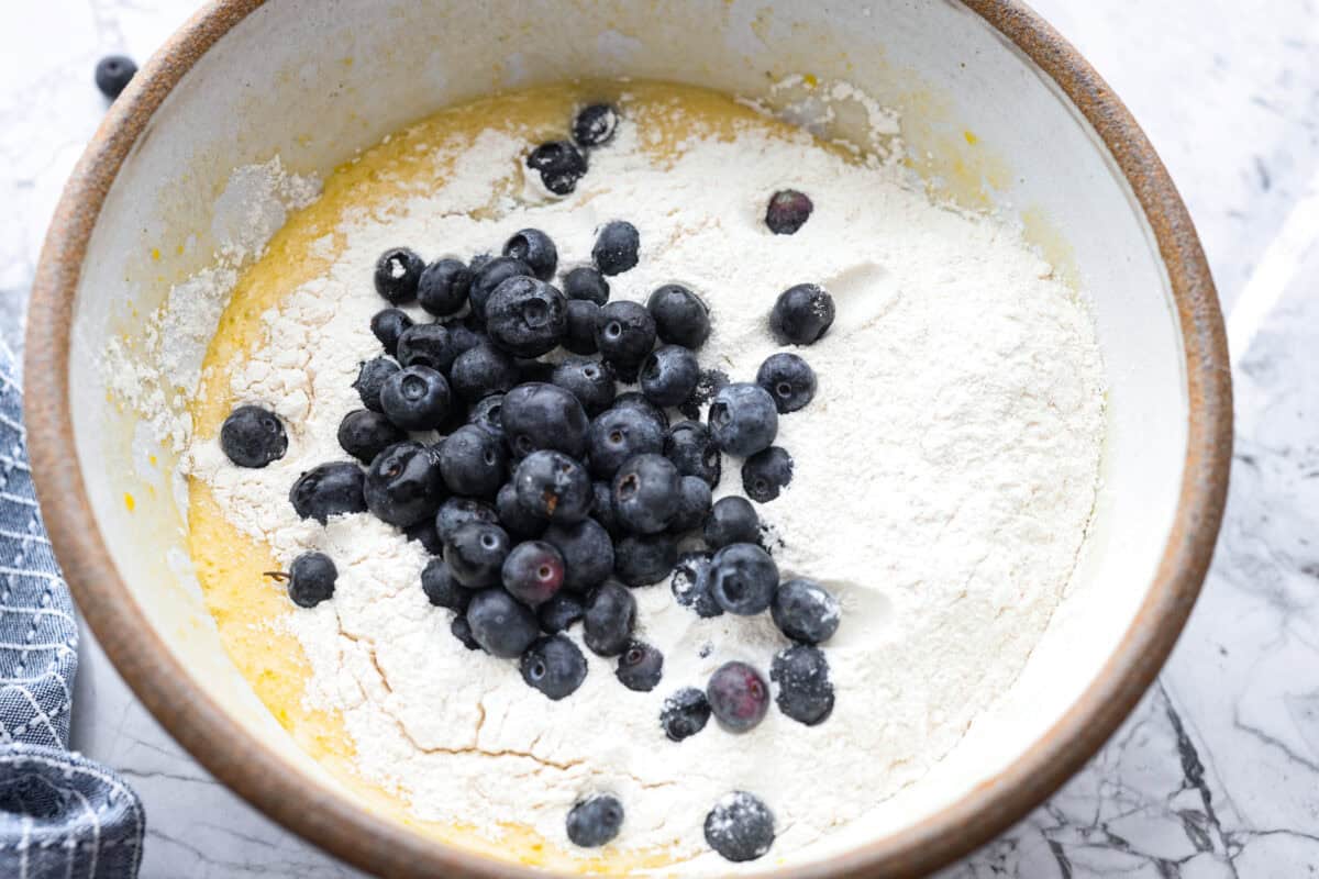 Butter mixture with flour and blueberries on top. 