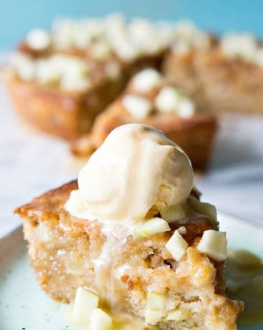 This light and fluffy apple skillet cake is topped with a homemade caramel apple glaze. Perfect for Fall baking!