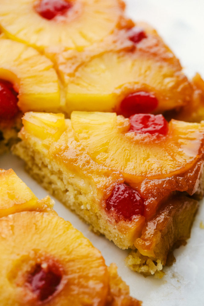 Close up on a slice of pineapple upside down cake.