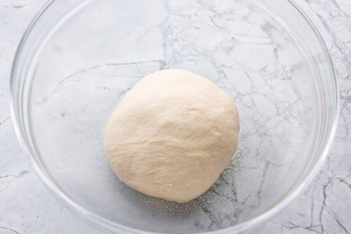 Ball of dough in a bowl. 