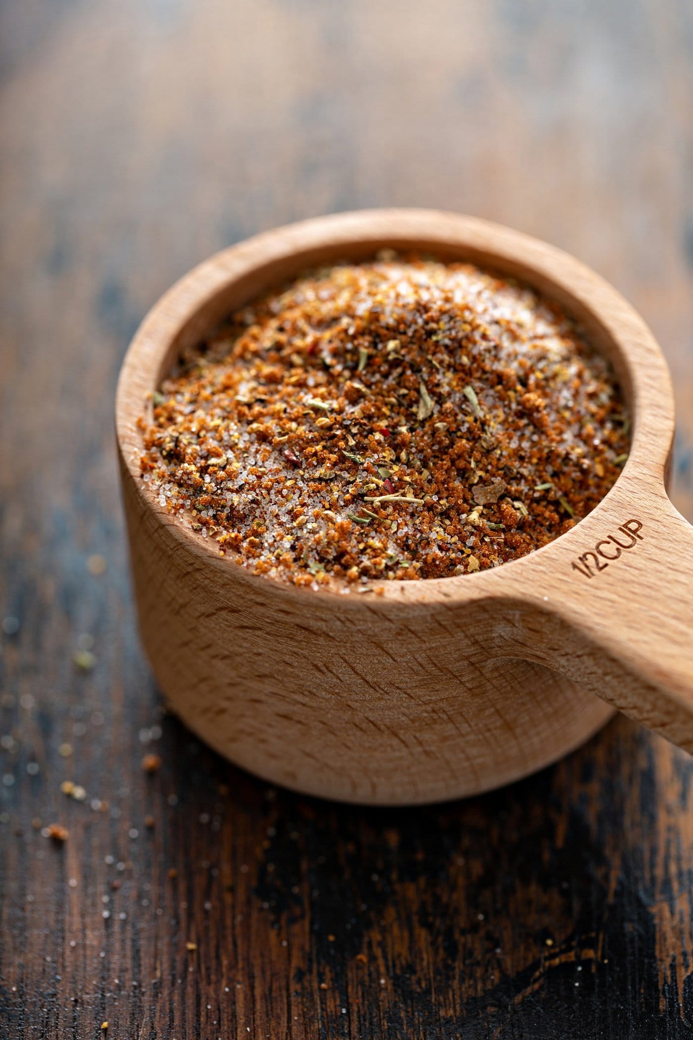 Rub for grilled ribs. The ingredients are mixed together in a measuring cup.