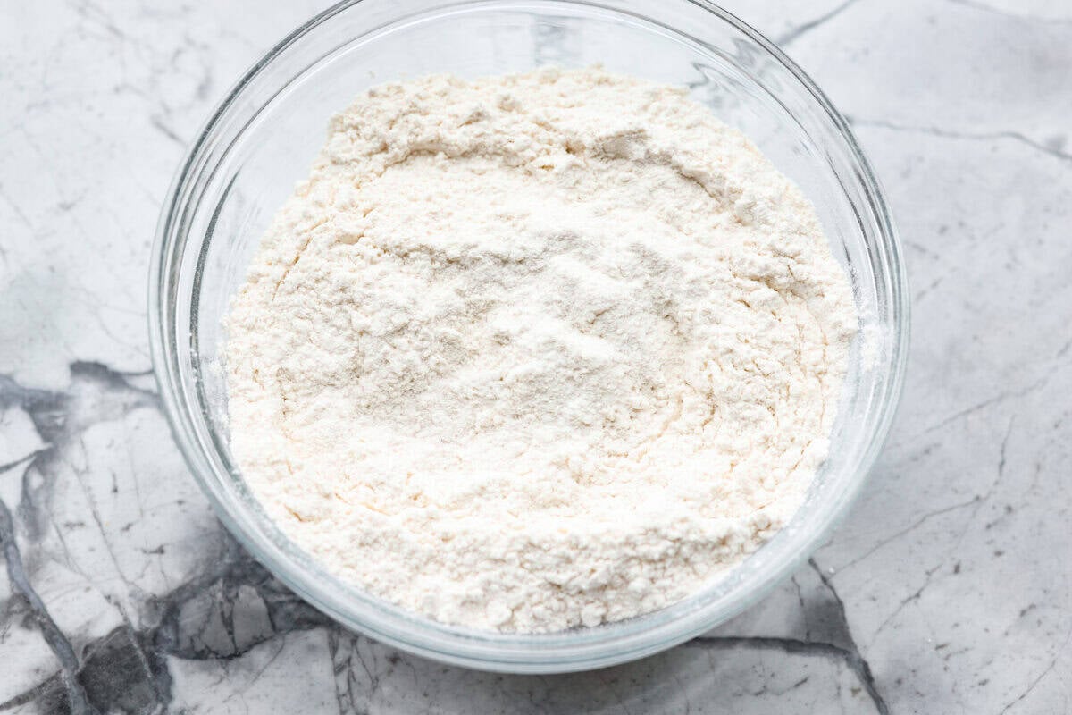Dry ingredients added to a bowl, 