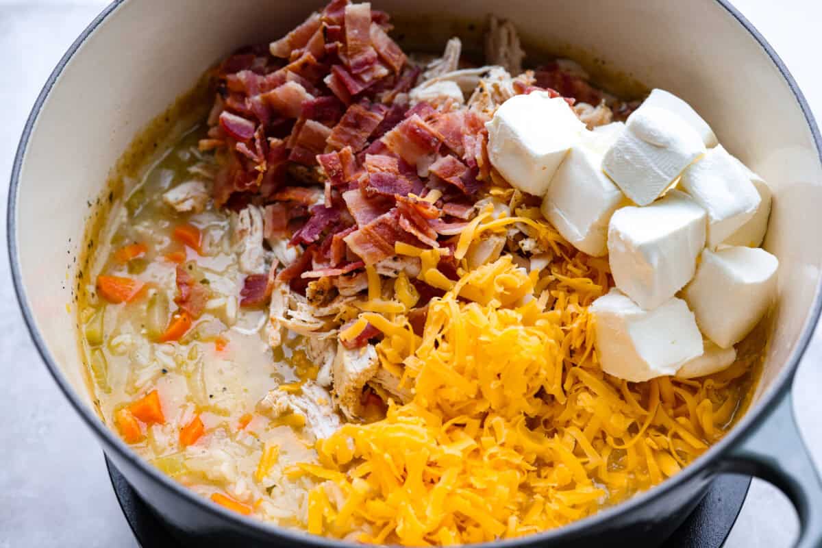 Cream cheese, bacon and cheese added to the crack chicken and rice soup.