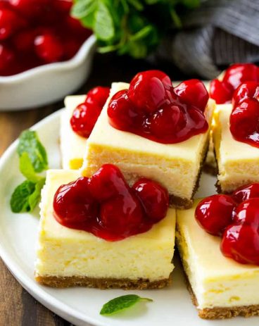These cherry cheesecake bars are the perfect make-ahead dessert for any occasion! Creamy cheesecake sits atop a homemade graham cracker crust, and is finished off with a generous helping of cherries.
