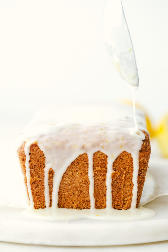 Finished glazed lemon bread loaf.