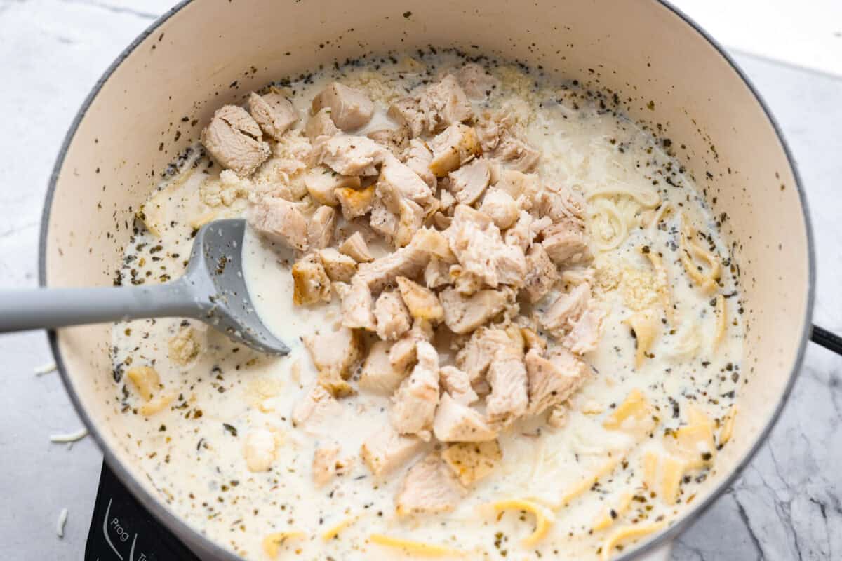 Pre-cooked chicken added to the soup. 