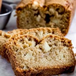 apple bread slices with cinnamon sticks beside it