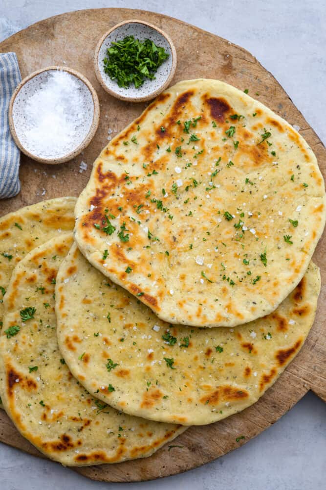 Flatbread on a wooden board.