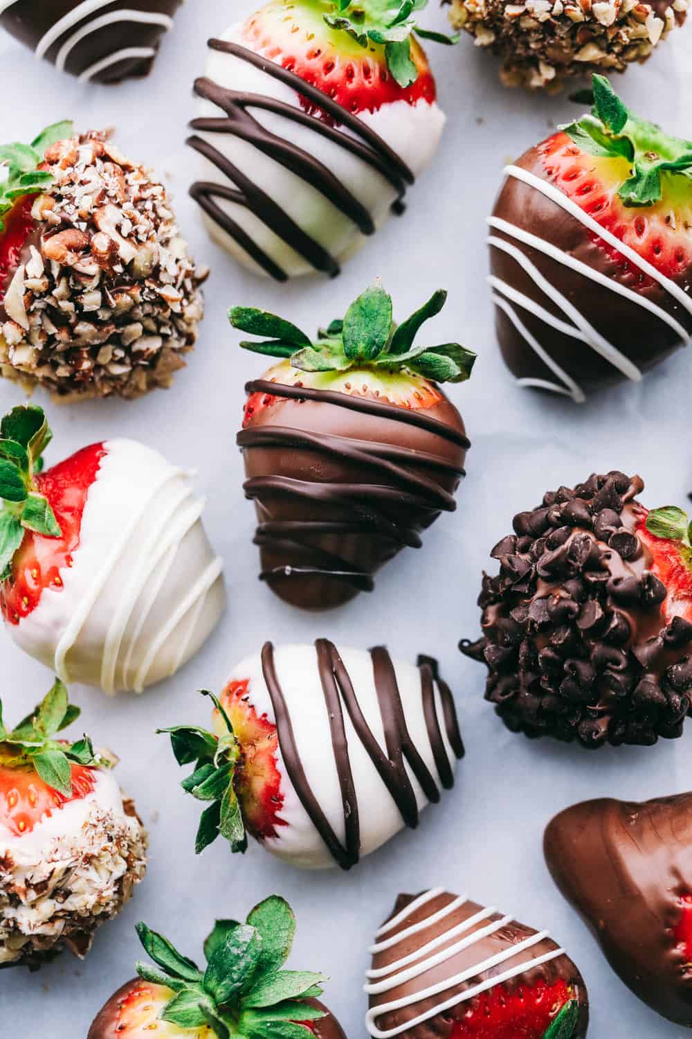 Chocolate covered strawberries with drizzle or specialty toppings.