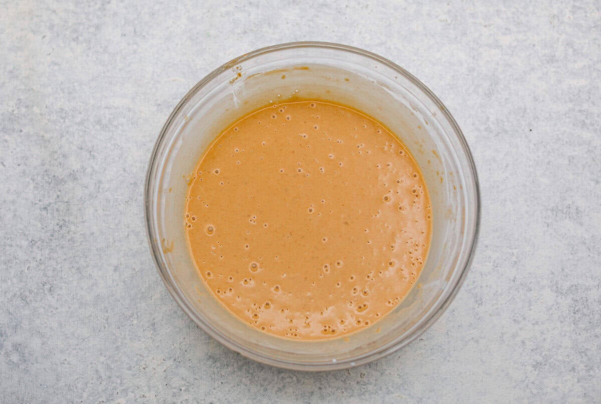 Sauce ingredients whisked together in a bowl. 