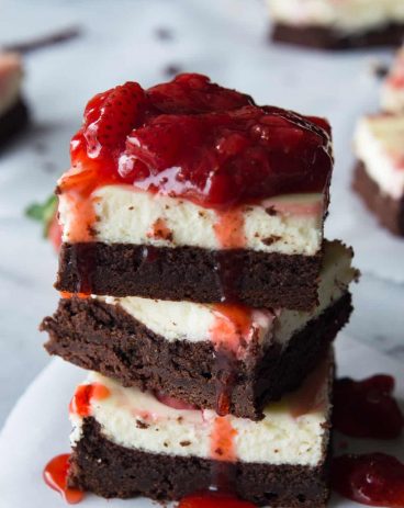 Strawberry Cheesecake Brownies. These homemade brownies are loaded up with a layer of creamy cheesecake then swirled with a sweet strawberry sauce for a pop of color and flavor! Spoon the extra strawberry sauce over the top for an extra special dessert!