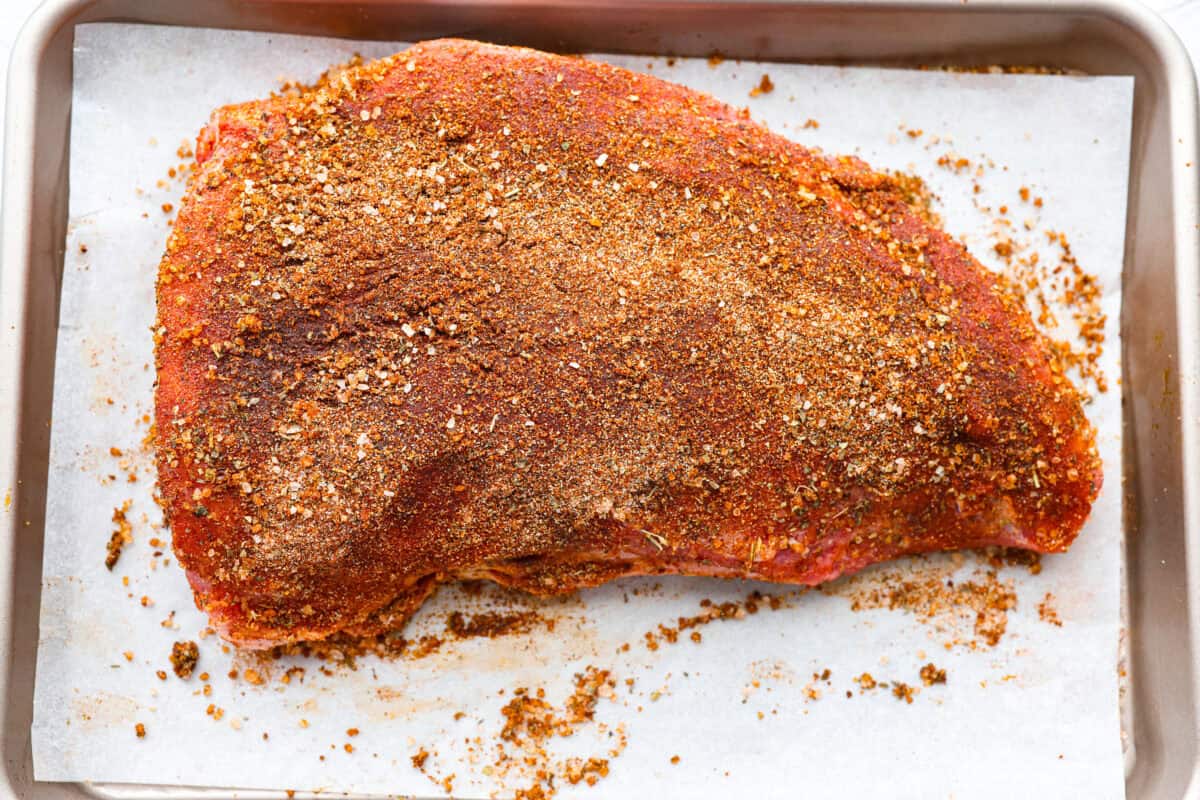 Tri Tip covered in oil and the spice rub. 