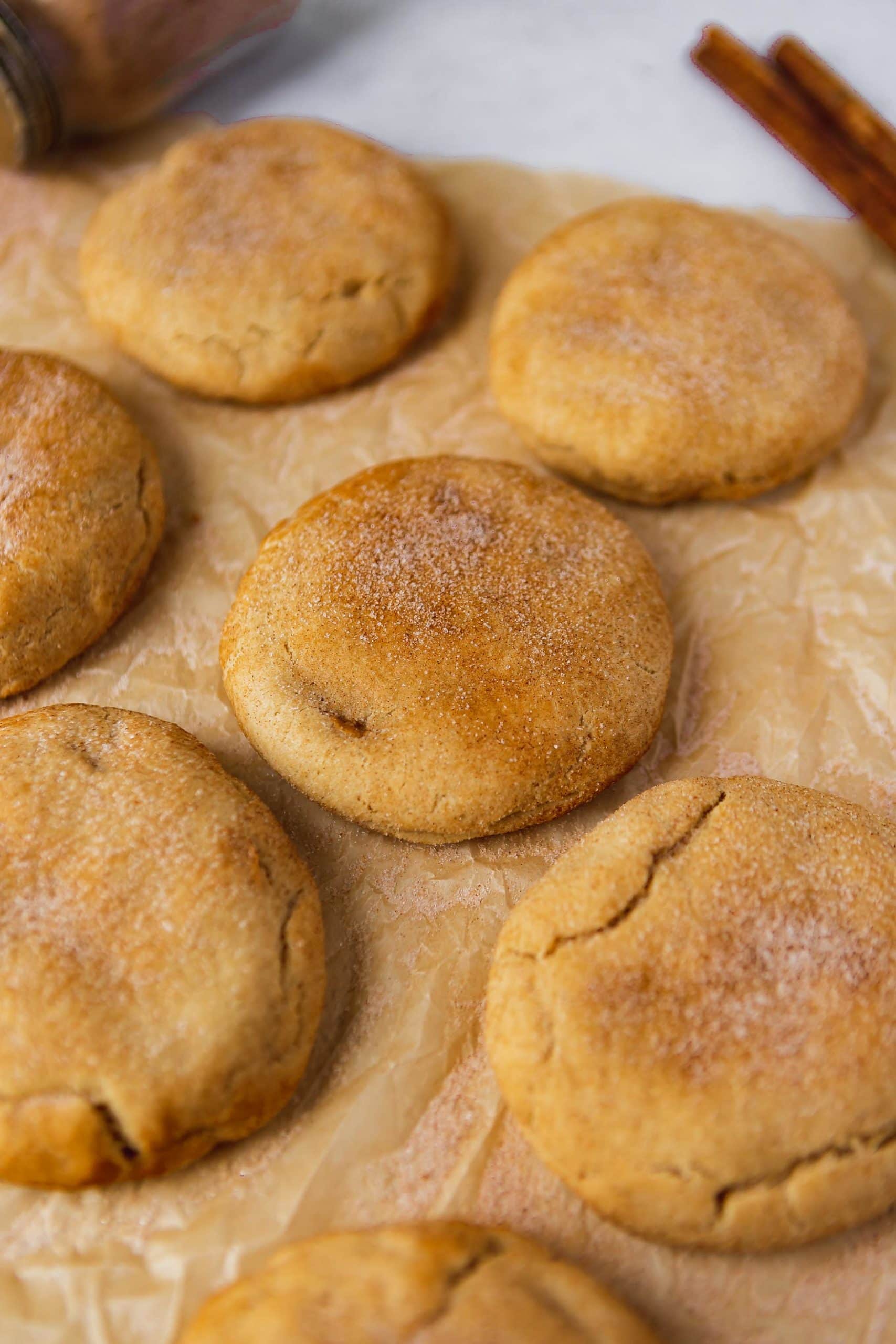 Baked snickerdoodles sprinkled with cinnamon sugar.