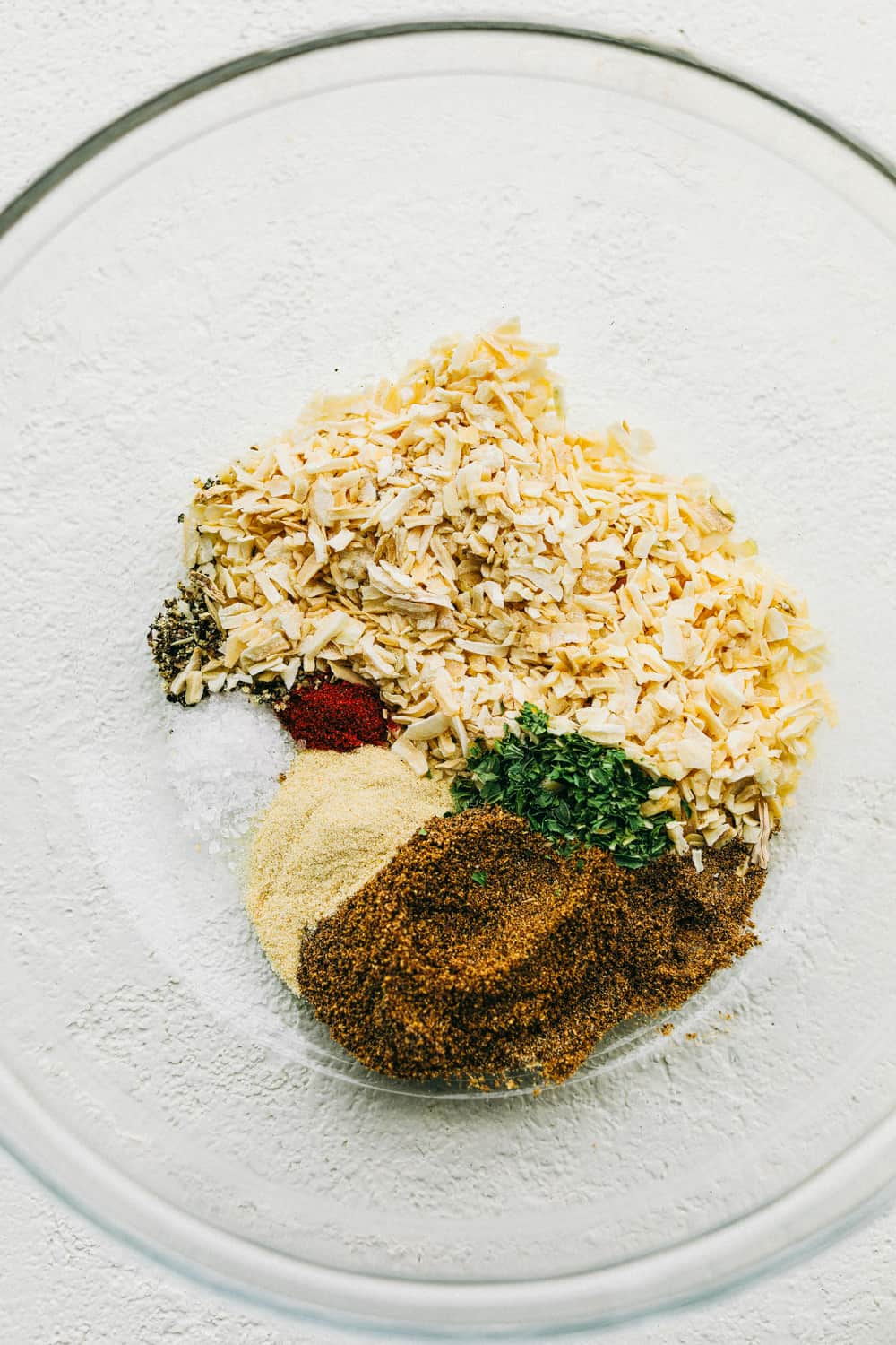 Bowl of spices for homemade onion soup mix.
