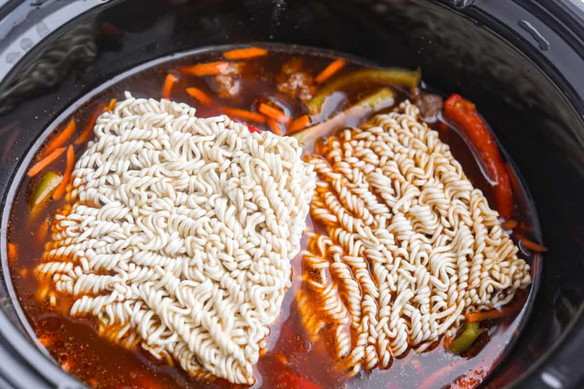 Noodles added to the crock pot. 