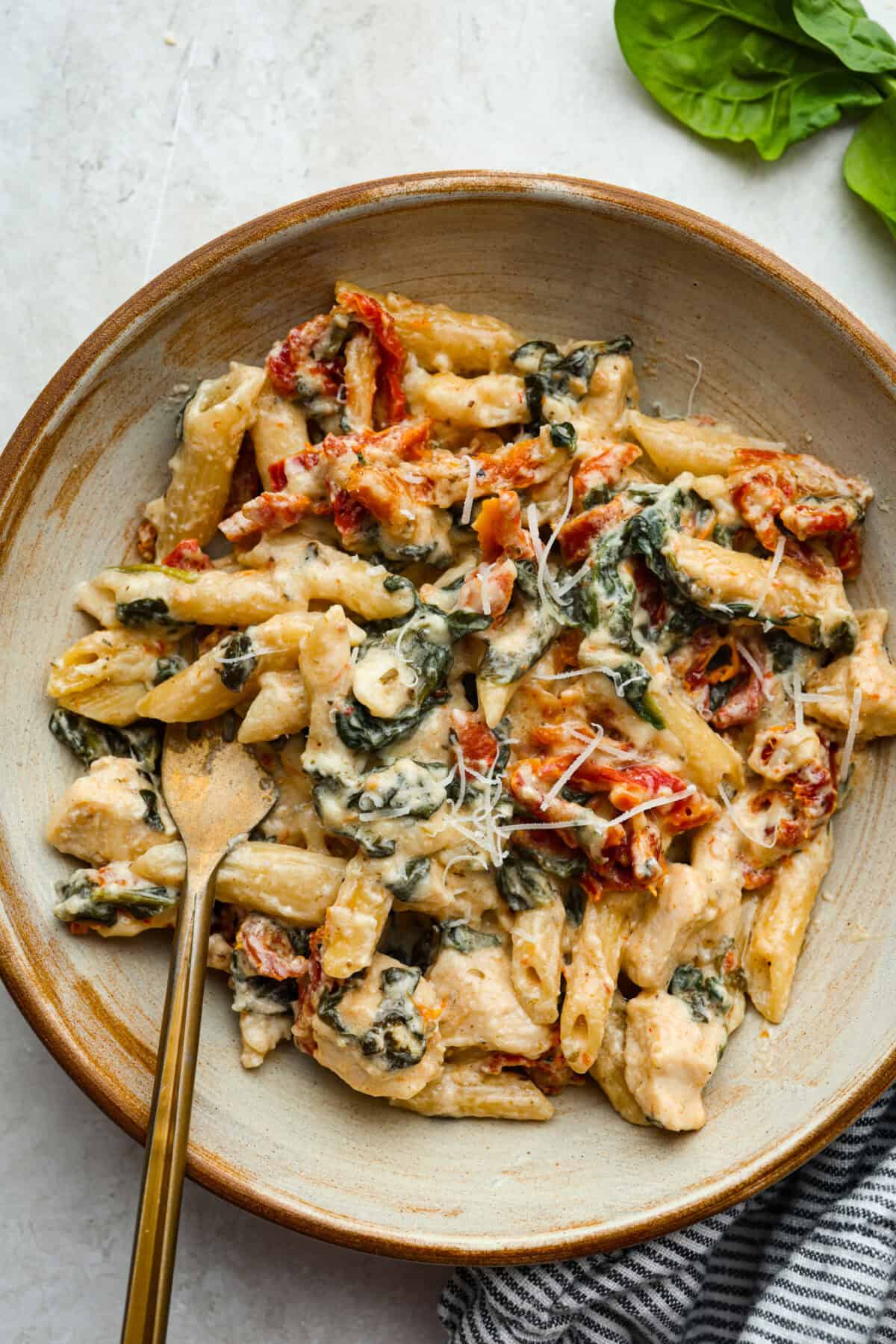 Plated tuscan chicken casserole. 
