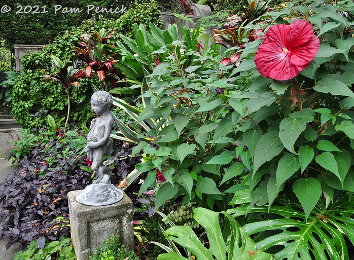 49_Young_boy_sculpture_Red_hibiscus.jpg