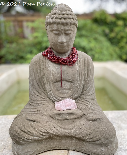 25_Buddha_statue_Red_necklace.jpg