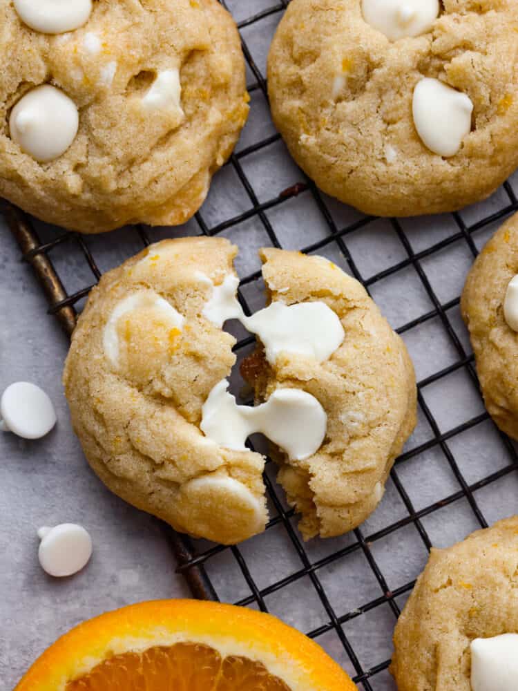 Closeup of a creamsicle cookie torn in half.