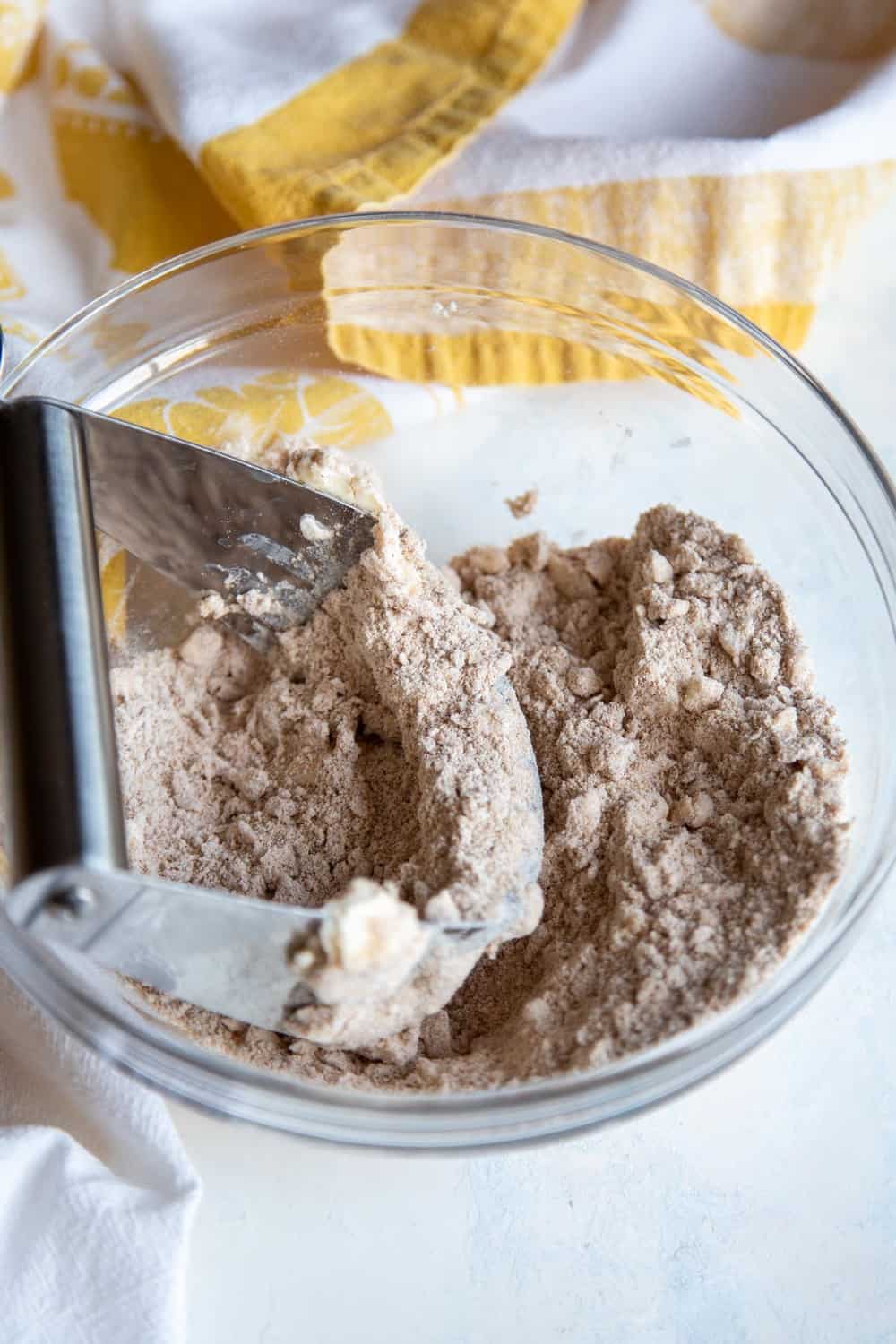 Making the cinnamon streusel in a bowl