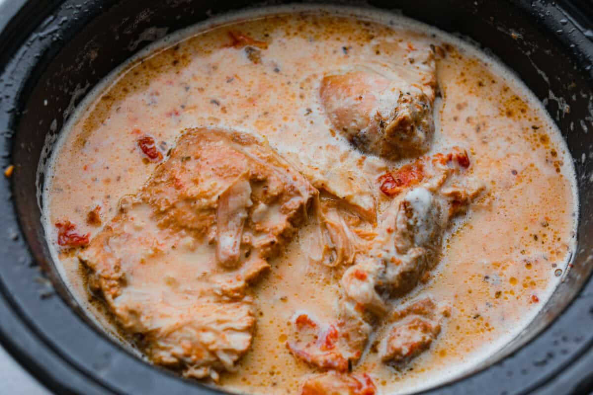 Cream added to the slow cooker. 