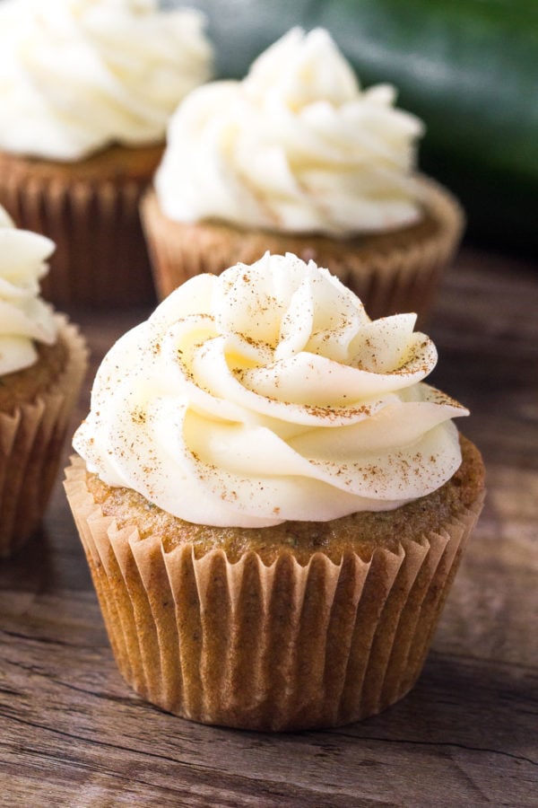 Zucchini cupcakes with cream cheese frosting are super moist with a delicious spice cake flavor and fluffy cream cheese buttercream. Zucchini cupcakes with cream cheese frosting are super moist with a delicious spice cake flavor and fluffy cream cheese buttercream.