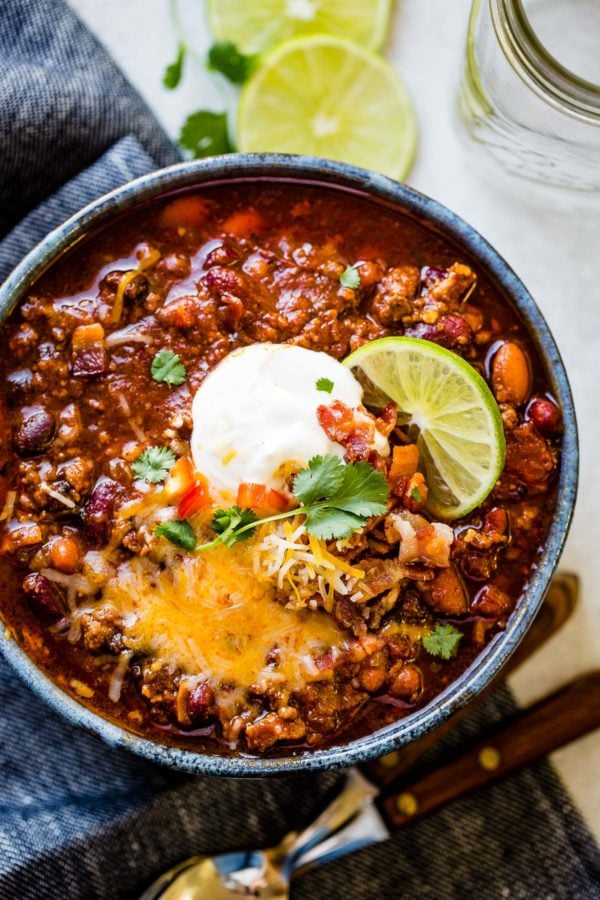 Want the best chili recipe for 2018? I got you covered with this instant pot award winning chili recipe and yes, there's bacon involved! ohsweetbasil.com Want the best chili recipe for 2018? I got you covered with this instant pot award winning chili recipe and yes, there's bacon involved! ohsweetbasil.com