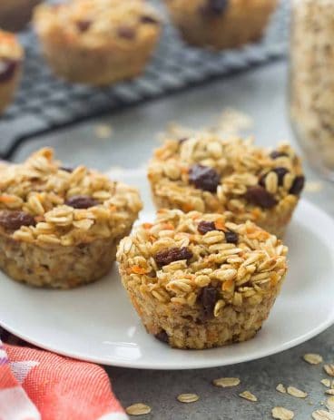 These Carrot Cake Baked Oatmeal Cups are super simple -- a great on the go breakfast, lunch or snack! Packed with fiber and protein and low in calories. These Carrot Cake Baked Oatmeal Cups are super simple -- a great on the go breakfast, lunch or snack! Packed with fiber and protein and low in calories.