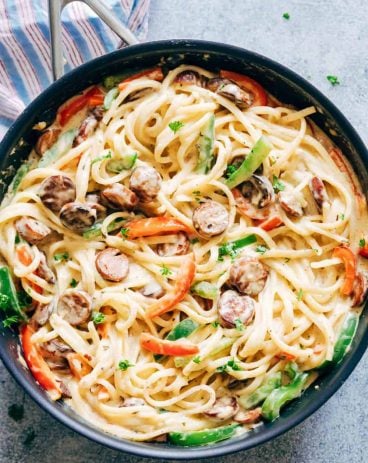 Creamy Cajun Sausage Linguine is a creamy 30 minute pasta recipe that's going to become a family favourite! Not too heavy on the cheese but still super creamy! Creamy Cajun Sausage Linguine is a creamy 30 minute pasta recipe that's going to become a family favourite! Not too heavy on the cheese but still super creamy!